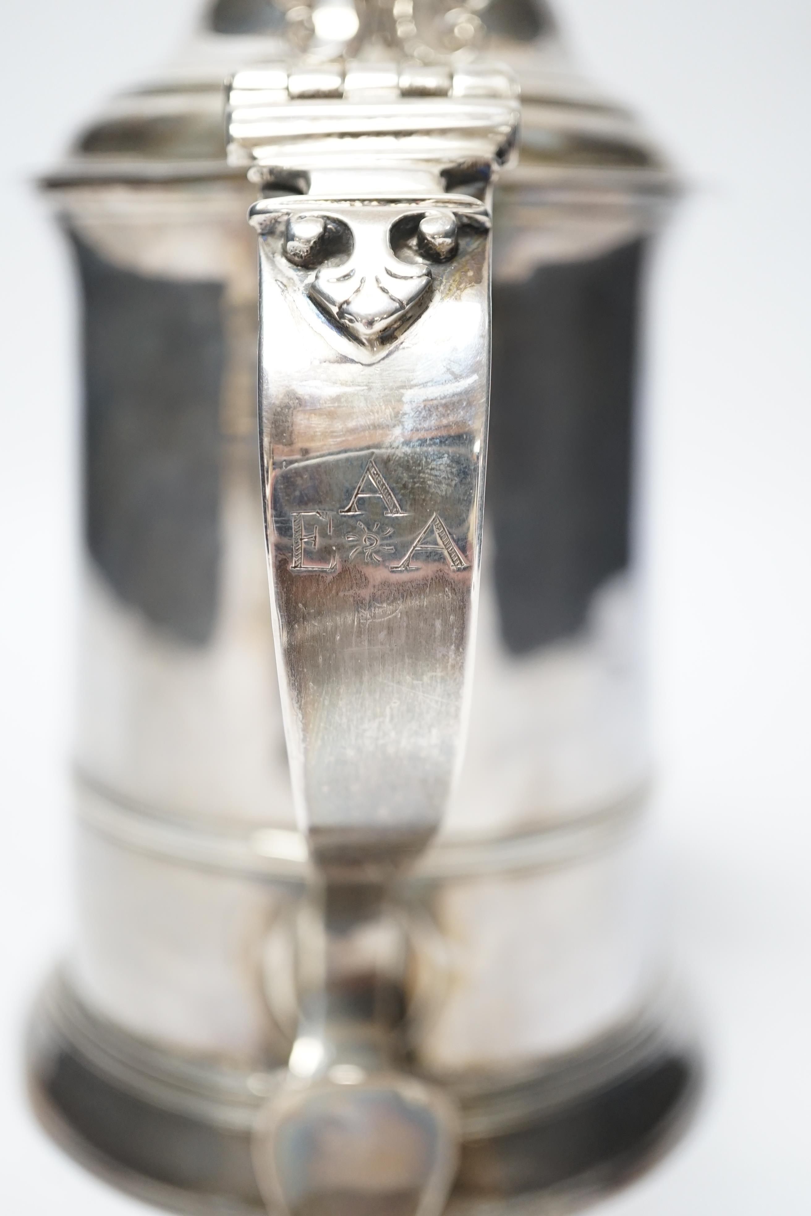 A George III silver tankard, with banded girdle, makers mark on lid and base differ?, London, 1784, height 17.5cm, 17.6oz. (a.f.)
